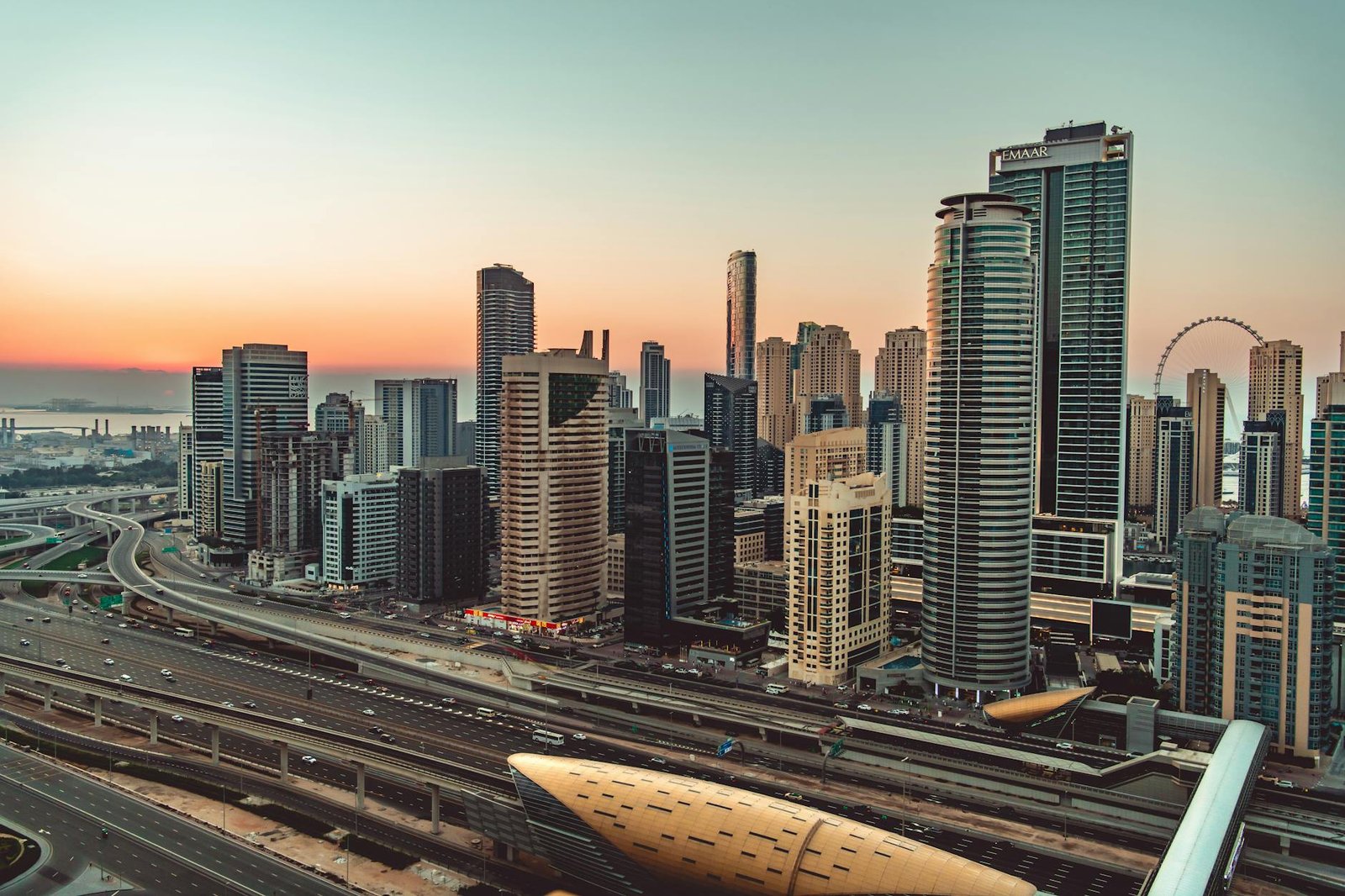 Breathtaking view of the Dubai Marina skyline at sunset, showcasing modern skyscrapers and vibrant urban landscape.