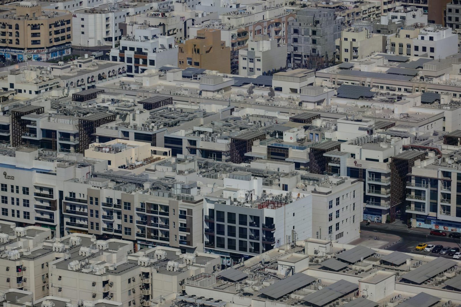 Aerial photograph showcasing densely packed urban architecture in Dubai's old city area.