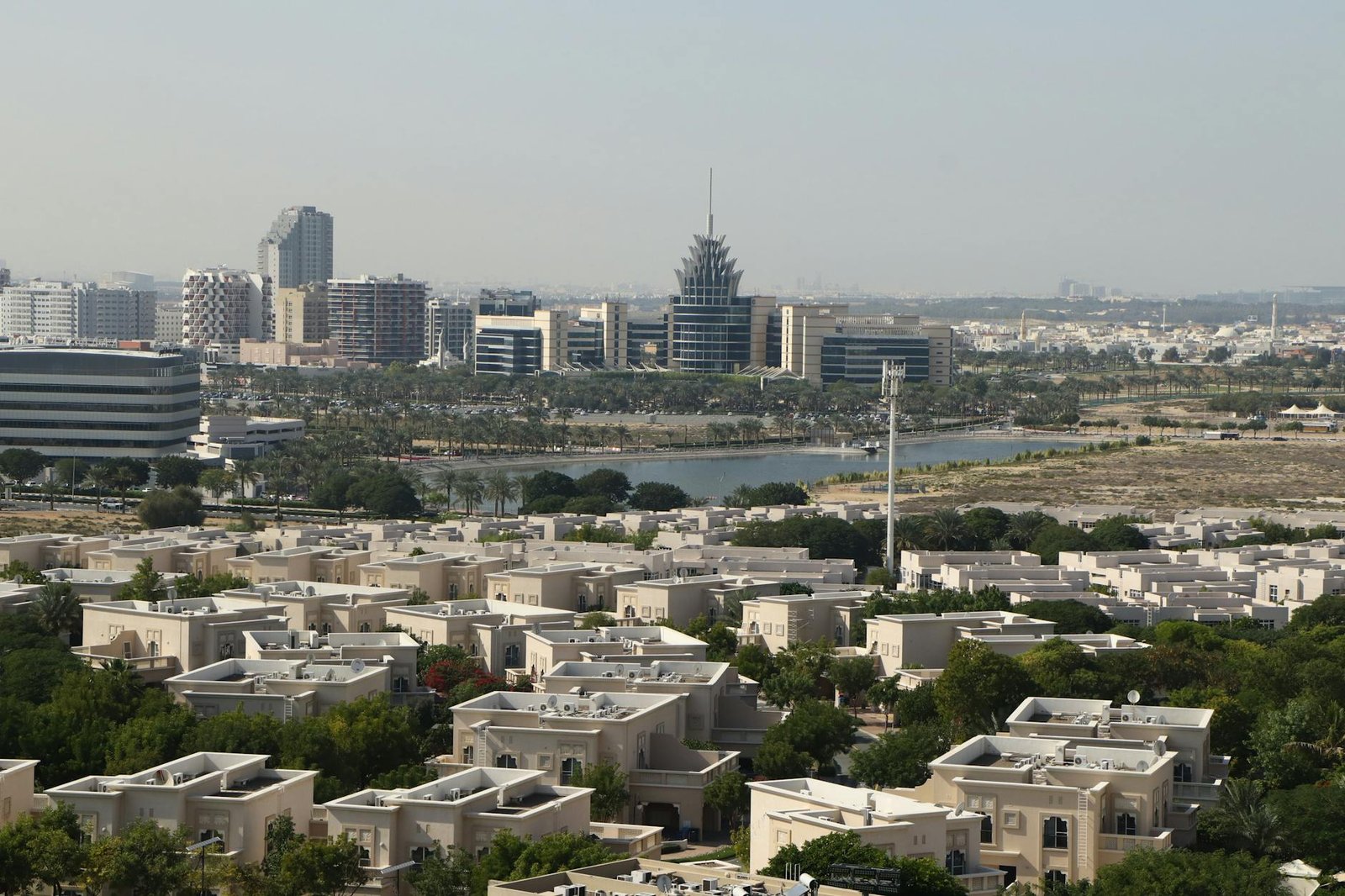 A scenic aerial view of Dubai Silicon Oasis with modern architecture and lush greenery.