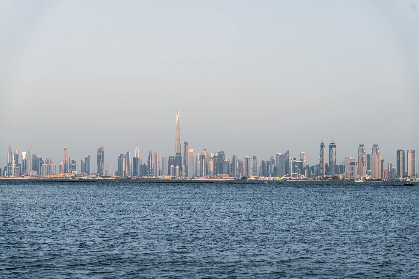 A stunning view of Dubai's skyline featuring Burj Khalifa across the sea.